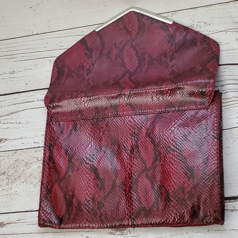 Mossimo women's vinyl envelope clutch burgundy, black snakeskin print